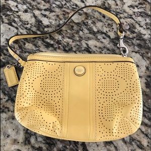 Like new without tag- Yellow Coach leather wristlet